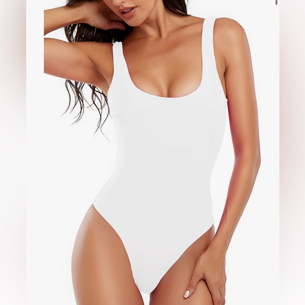 One piece white high cut swim suit